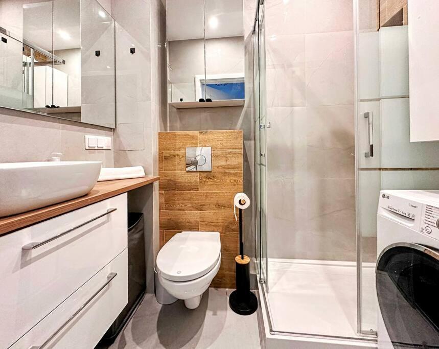 Апартаменты Warsaw Concierge Wiatraczna Экстерьер фото
